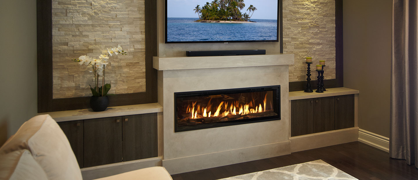 Cast stacked stone fireplace mantel and Linear gas fireplace